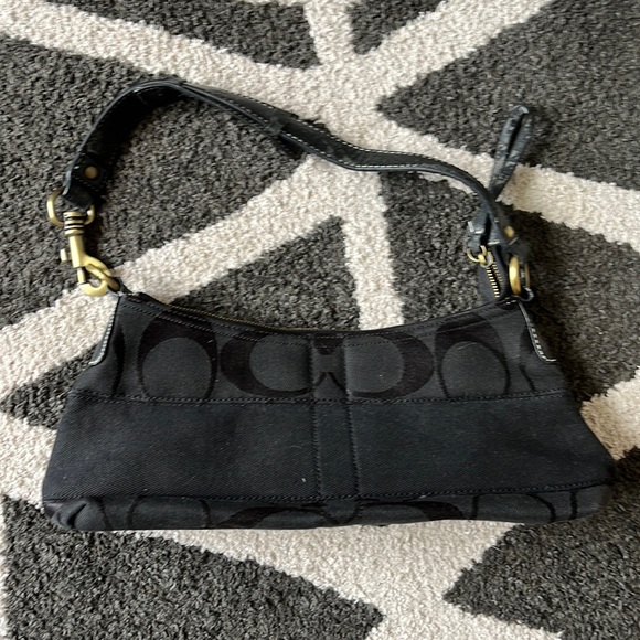 Coach Handbags - Coach mini purse- has had a lot of love
